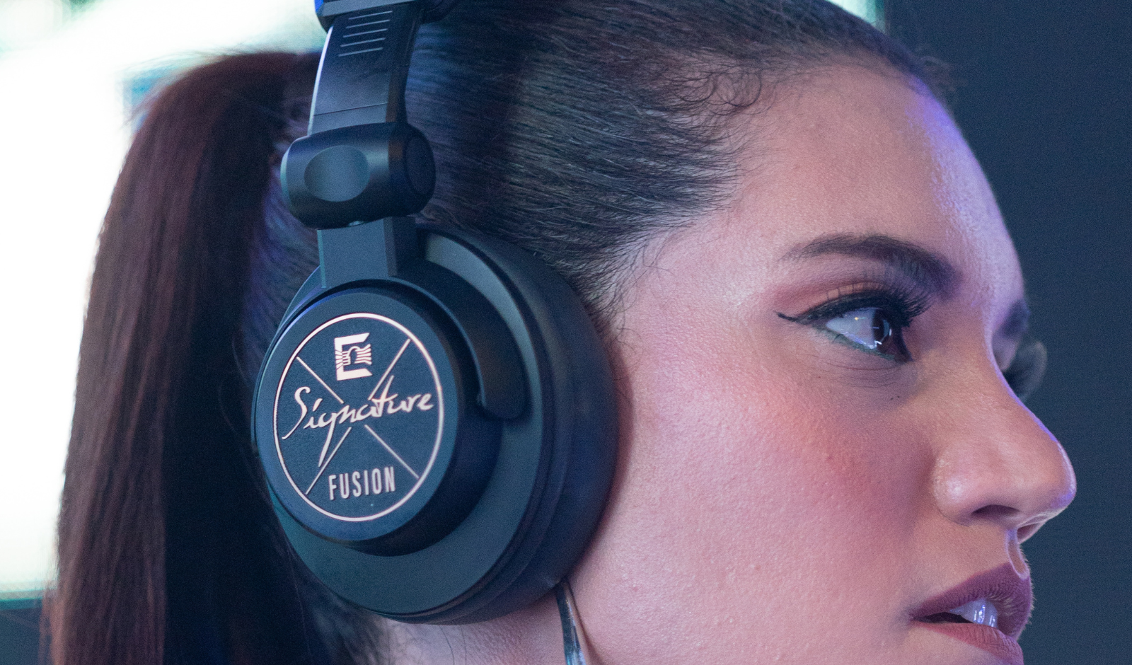 woman wearing ultrasone headphones