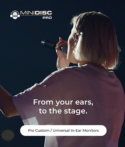 Photo of stage performer wearing custom in ear monitors, with overlayed link to Shop Pro Custom In-Ear Monitors.