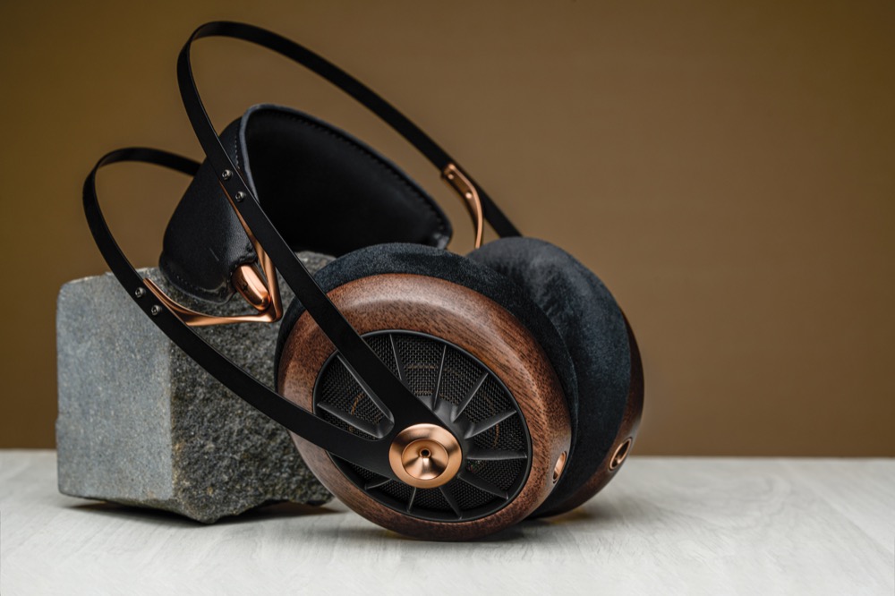 Photo of Meze Audio 109 Pro leaning against stone block