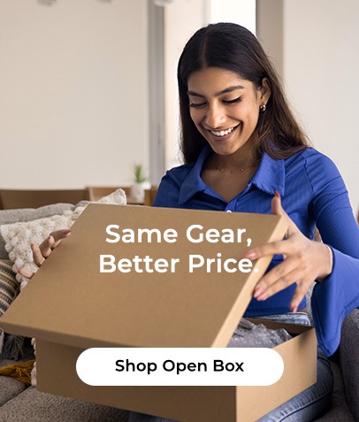 Photo of women opening cardboard shipping box with happy expression. Text on image reads 'Same Gear, Better Price, Shop Open Box'